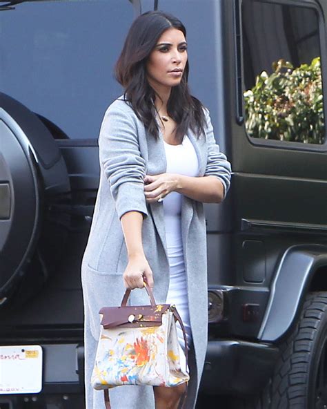 Kim Kardashian carries 0k Hermes handbag while 